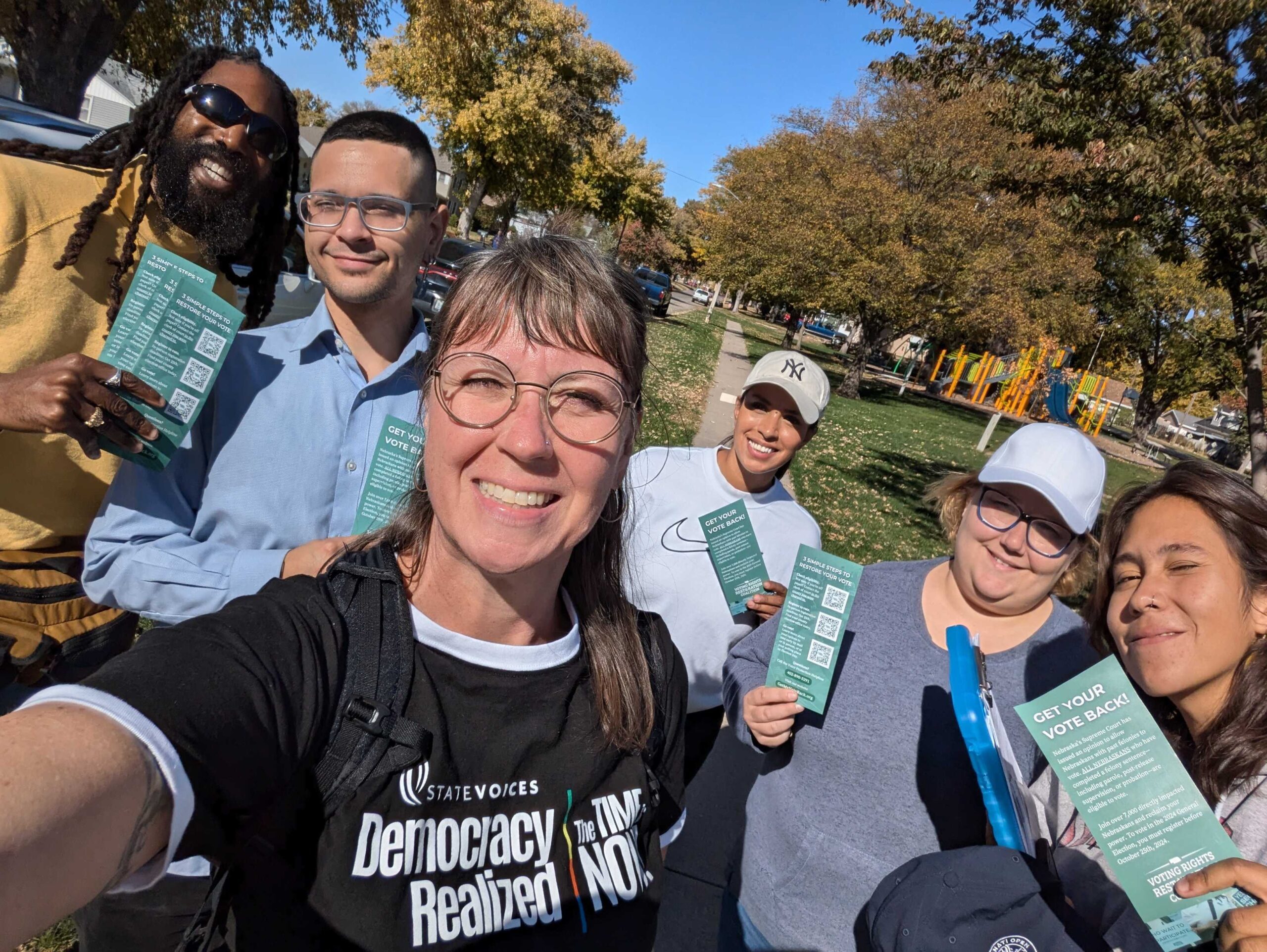 Staff from the Nebraska Civic Engagement Table and State Voices national canvass in a Omaha neighborhood to tell residents about the Voting Rights Restoration Coalition's work.